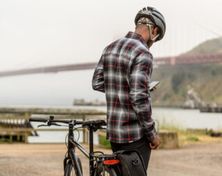 Man standing by Marin Bike by Golden Gate Bridge
