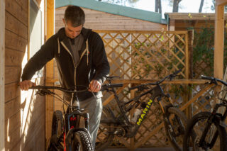 Marin's Matt Cipes, adjusting a mountain bike, Italy.