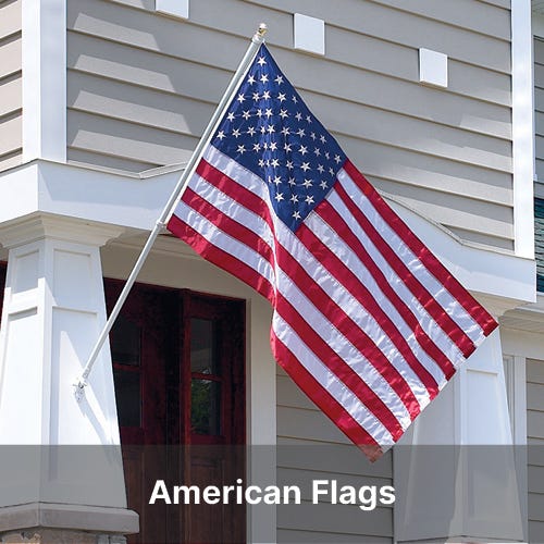 United States flag flying from the tangle free flagpole - Shop American Flags