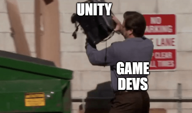 Ron Swanson acting as a game developer throwing away Unity in the trash